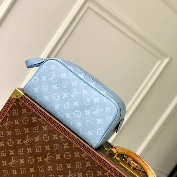 DOPP KIT 28 IN BLUE MONOGRAM COATED CANVAS